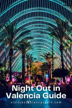 the inside of an indoor mall with palm trees and neon lights in the background text reads night out in valencaa guide