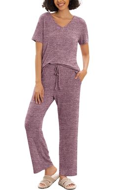 PRICES MAY VARY. Material: Our women's pajama sets are made of super comfy ribbed fabric, the 2 piece lounge set provides an exceptional level of comfort. This material is not only comfortable but allows you to relax in the most serene surroundings Features: The cozy Pjs sets have a unique v neck design and split at the hem of the top. Soft fabrics, short sleeves and long pants are designed to maximize home living comfort. Besides，pockets on either side of the pant make it easy to store small it Casual Ribbed Sleepwear For Loungewear, Casual Ribbed Sleepwear For Lounging, Casual Ribbed Sets For Loungewear, Casual Ribbed Sleepwear With Relaxed Fit, Casual Ribbed Sleepwear In Solid Color, Casual Ribbed Sleepwear, Casual Ribbed Solid Color Sleepwear, Casual Solid Ribbed Sleepwear, Comfortable Ribbed Sleepwear For Loungewear