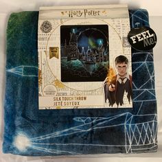 a harry potter themed blanket with an image of hermion's castle