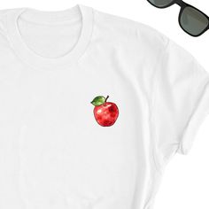 We have express delivery for our shirts! 📦⚡.  From cart to door in just 2-3 days, only for 3.5 USD extra.  You can find the express delivery option in the cart. Apple Shirt, Cute Apple Lover Tee Shirt, Apples Tee Top, Apple Lover T-Shirt, Apple Gift Shirt, Cute Apple Icon UNISEX T-Shirt Lover Friends will love it! This t-shirt feels soft and lightweight, with the right amount of stretch. It's comfortable and flattering for both men and women.  * 100% cotton (heather colors contain polyester) * Apple Gifts, Apple Icon, Presents For Boyfriend, Lovers And Friends, Top Tee, Boyfriend Gifts, Tee Shirts, Adult Outfits, T-shirt