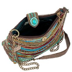 Strand after strand of beads in tones of turquoise, garnet, bronze & gold drape across the front of this crossbody handbag creating a fun boho feel that makes a bold fashion statement. It's roomy interior, padded shoulder strap and secure zipper and magnet flap closure make it the perfect companion for festival outings or everyday adventures. 9.75 x 3.75 x 7" Strap Length End to End: 49" Strap Drop: 24.25" Non-removable crossbody chain strap with padded shoulder piece zipper and magnetic flap cl Gold Drapes, Shoulder Piece, Handbag Boutique, Mary Frances, Everyday Adventures, Brown Handbag, Bronze Gold, Beaded Bags, Shoulder Handbag