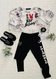 FOR MORE BAD BUNNY ITEMS FOLLOW THE LINK BELOW https://www.etsy.com/shop/5pointproductions?ref=search_shop_redirect 🚨PLEASE READ CAREFULLY Items sold separately **. BAD BUNNY / El Conejo Malo Cropped T-Shirt available in plain white or tye dye. I Love Bad Bunny design. Wear these to the Ultimo Tour Del Mundo Bad Bunny Concert and turn heads Cropped TShirts are oversized for a modern look. Made of 65% Polyester, 30% Cotton, 5% Spandex Leggings are soft and super stretchy. True black and very opa Fun Black Bottoms For Spring, Casual Graphic Print Bottoms For Playwear, Casual Winter Leggings For Streetwear, Casual Winter Streetwear Leggings, Trendy Letter Print Sets For Winter, Trendy Winter Sets With Letter Print, Trendy Letter Print Streetwear Sets, Sporty Letter Print Sets For Spring, Trendy Spring Leggings For Streetwear