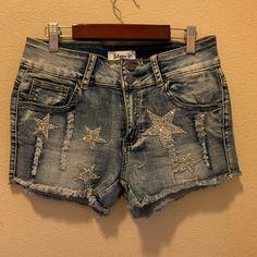 Between Us Shorts With Bling Stars Brand: Between Us Size: 11 Condition: Near Perfect Never Worn, Only Fit Tested Them And They Were To Small From A Smoke Free And Pet Free Home Spring Star Print Short Bottoms, Trendy Blue Shorts With Star Print, Trendy Blue Star Print Shorts, Blue Star Print Short Bottoms, Blue Shorts With Star Print, Blue Star Print Shorts, Cotton Star Print Shorts, Denim Star Print Shorts, Rhinestone-embellished Short Denim Bottoms