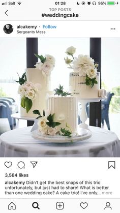 two wedding cakes sitting on top of a table