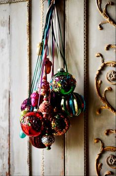 ornaments hanging from the side of a wooden door