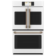 two ovens side by side, one with gold handles and the other in white