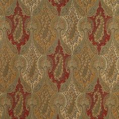 a red and gold paisley pattern on fabric