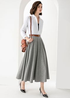 Elegant Long Gray Skirt, Elegant Gray Flowy Skirt, Gray Relaxed Fit Lined Maxi Skirt, Gray Relaxed Fit Maxi Skirt With Lining, Gray Relaxed Maxi Skirt With Lined Skirt, Gray Flared Maxi Skirt With Lined Skirt, Gray Relaxed Maxi Skirt With Lining, Gray Flared Maxi Skirt With Lining, Gray Long Skirt For Work