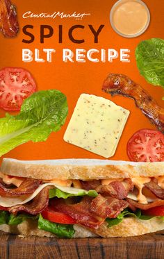 a sandwich with bacon, lettuce and tomatoes on it