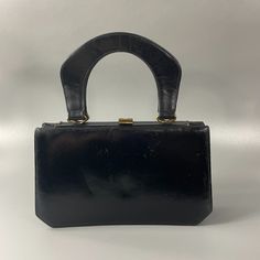 Vintage Susan Gail Original 1950's - 60's Black Leather Top Handle Handbag 1950s To Early 60's Top Handle Handbag In A Refined High Quality Leather Of Deep Navy Blue. The Profile Is Amazing, And So Contemporary That It Is Hard To Believe This Is Vintage. The Handbag Opens Up Like A Expanding Accordion File.. Beautiful & So Practical! The Inside Has A Maker Label That Reads: Susan Gail Originals Well Cared For, This Awesome Handbag Is In Excellent Vintage Condition... With No Issues To Note. This Vintage Top Handle Evening Bag For Formal Occasions, Vintage Leather Bag For Evening, Retro Leather Evening Bags, Vintage Formal Evening Bag With Top Handle, Vintage Black Rectangular Evening Bag, Vintage Leather Evening Bag, Mid-century Leather Evening Bag, Mid-century Style Leather Evening Bag, Vintage Black Bag For Vintage Events