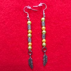 Beautiful, Silver Dangle Earrings In Lime Green & Yellow Pearl Beads. Silver Spacer Beads & Feather Charms. Nwt, Handmade By A Charmed Life Feather Charm Earrings, Shoulder Duster Earrings, Yellow Pearl, Feather Charms, Silver Dangle Earrings, Beaded Jewelry Diy, Silver Earrings Dangle, Jewelry Diy, Charm Earrings