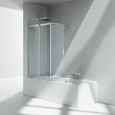 a white bathroom with a tub, sink and shower head in the middle of it