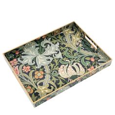 an ornately decorated tray with flowers and leaves on black, green, yellow and red colors