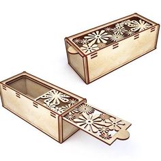 two wooden boxes with intricate designs on the lids and sides, one opened to reveal an inner compartment