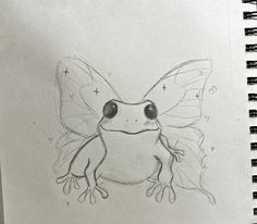 a drawing of a frog with wings on it's back and eyes wide open