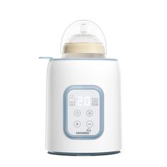 a white and blue baby bottle with thermometer on it's side, in front of a white background