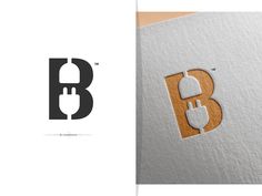 the letter b is made out of wood and has an image of a mouse on it