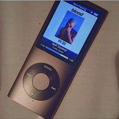 an mp3 player sitting on top of a table