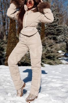 Handmade warm snowsuit for women. Warm, stylish and so comfy -mittens, belt and purse are included into the set - fur on the hood and sleeves is detachable  - inside the snowsuit there's a special heat reflective membrane -snowsuit one piece is of the highest quality, warm, insulated performance ski wear.  -built to last all winter long -combination of warmth, style and coziness -fabric protects from any strong wind and rain, premium insulation "Omne Heat" --keeps you warm during the lowest temperatures -deep hood, natural polar fox fur, steel accessories   Be the queen of the snowy mountain hills!     S=4 US numeric BUST 33.8-34.6 inches or 86-88cm WAIST 25.9-26.7 inches or 66-68cm HIPS 35.4-37 inches or 90-94cm   M=6 US numeric BUST 35.4-36.2 inches or 90-92cm WAIST 27.1-28.3 inches or 6 Winter Outdoor Long Sleeve Jumpsuits And Rompers, Snowsuits For Women, Womens Snowboarding, Jumpsuit Winter, Ski Jumpsuit, Winter Jumpsuit, Women Ski, White Slip Dress, Luxury Tents