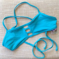 New Athletic Jolyn Tomcat Supportive Bikini Top In Turquoise, With Vent Feature That Allows Water To Pass Through During Workouts. Model Shots Show How The Adjustable Front And Backside Appears. Never Worn With Tag Attached. Large. Made In Usa. Good For: Swim, Surfing, Water Polo, Surfing, Paddling, Lifeguarding, Ocean Activities, Pool Activities, Lifestyle Tie-Back Straps Lined For Maximum Privacy Full Coverage Unpadded Medium/High Impact Tagless For Maximum Comfort Chlorine Proof Pill-Resistan Jolyn Swimwear Bikinis, Jolyn Swim, Jolyn Swimwear, Summer Shopping List, Model Shots, Swim Practice, Triangle Swim Top, Pool Activities, Ocean Activities