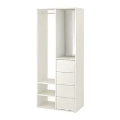 a tall white cabinet with drawers and shelves