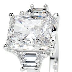 an engagement ring with a princess cut diamond