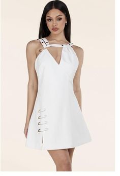 This white dress has a draped around the bodice, bondage-style straps and a daring side slit that’s held together by gold safety pins. Self: 96% Polyester 4% Spandex Lining: 96% Polyester 4% Spandex Invisible Back Zipper Safety Pin Dress, Pin Dress, Safety Pins, Dress For Sale, Phoenix Az, 50's Dress, Safety Pin, Dress With Boots, Mini Black Dress