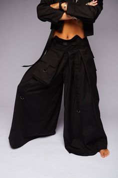 Made from Italian cotton Cotton 88% elastane 12% Trendy Oversized Full-length Pants, Relaxed Fit Wide Leg Bottoms With Multiple Pockets, Oversized Wide Leg Solid Color Pants, Oversized Solid Wide Leg Pants, Solid Oversized Wide Leg Bottoms, Oversized Solid Wide Leg Bottoms, Urban Style Baggy Wide Leg Bottoms, Oversized Solid Color Bottoms With Pockets, Stretch Wide Leg Pants For Streetwear