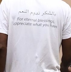 a man wearing a t - shirt that says for external blessing, appreciate what you have