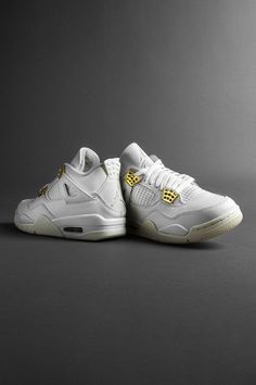 The Women’s Air Jordan 4 “Sail” puts a decidedly premium twist on the legacy sneaker with flashy metallic gold accenting and a monochromatic off-white color scheme. If you’re looking for a versatile shoe to wear this season, look no further than the “Sail” Jordan 4. Luxury Air Jordan 4 Lace-up With Perforations, Air Jordan 4 Stadium Goods, Jordan 4 Off White Beige, Air Jordan 4 Sail Canvas, Air Jordan 4 Off White Sail, Sail Jordan 4, Air Jordan 4 Sail, Jordan 4 Sail, Sneaker Culture