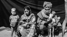 two women and a child sitting next to each other