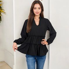 The Anna-Kaci Women's Long Sleeve Tiered Babydoll Blouse is a charming addition to your casual wardrobe. Featuring a flattering V-neckline, this blouse is designed with tiered layers that create a playful, flowy silhouette. The long sleeves with elastic cuffs add a touch of elegance while providing comfort and ease of movement. Perfect for pairing with jeans or leggings, this babydoll blouse is ideal for a casual day out, offering both style and comfort in one effortless piece. Babydoll Blouse, Bishop Sleeve, Satin Shirt, Boyfriend Fit, Shop Blouses, Casual Fits, Short Sleeve Blouse, Casual Wardrobe, Trending Shirts