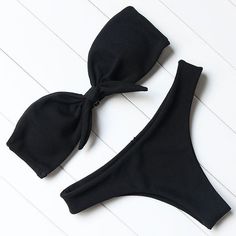 Material: Others, Nylon, Polyester • Style: Women Strapless Style Bikini Set • Item Type: Bikinis Set • Pattern Type: Solid • Waist: Low Waist • Fit: Fits True To Size, Take Your Normal Size • Support Type: Wire Free • With Pad: Yes • Application: Beach Party, Swimming Pool • Quality: Super • Have Lining: Yes • The Strap Can Removable: Yes Strapless Nylon Swimwear For Summer, Black Bandeau Swimwear For Pool, Fitted Black Swimwear For Beach Party, Black Bandeau Swimwear For Swimming, Black Bandeau Swimwear For Party, Solid Bandeau Swimwear For Party, Black Strapless Swimwear For Beach Season, Black Strapless Swimwear For Vacation, Black Strapless Swimwear For Party