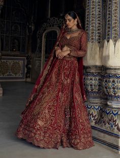 Make a stunning statement in this red raw silk lehenga choli set, featuring antique kasab embroidery in contrasting resham tones, enhanced with dabka, beads, sequins, and crystals. It comes with a second worked dupatta. Kasab Embroidery, Red Bridal Lehenga, Embroidered Bridal Lehenga, Desi Clothing, Silk Lehenga Choli, Raw Silk Lehenga, Bridal Lehenga Red, Red Lehenga, Indian Wedding Wear