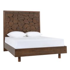 a bed with wooden headboard and white pillows on it's sides, against a white background