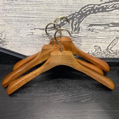 【Solid Wood Constructions】 Hangers are well crafted of premium quality solid camphorwood. The smooth natural finish provides a captivating look to your closet.  Single Suit hanger size is:For Man: 17.5 X 9.4 X 1.8 inch.Woman:15.7X9.4X1.37 【Ergonomic Design】Inward curving wide shoulders, specially designed for suits and jackets that need to maintain their shape. It helps distribute garment weight evenly and preserves collars and drape, perfect for hanging your expensive, well-made suits. 【360o Sw Wood Coat Hanger, Wooden Coat Hangers, Wide Shoulders, Suit Hangers, Coat Hangers, Wood Hangers, Suits And Jackets, Clothing Storage, Coat Hanger