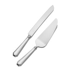 two knives and a fork on a white background