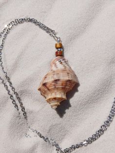 Handmade pendant necklace using unaltered, unique shells with sterling silver and agate accents. Shells vary but average 1 inch in size. Customize with a stainless steel or sterling silver chain 24 inches. All chains use a simple lobster claw clasp. Each necklace is one of a kind! See my other listing for more variations: https://www.etsy.com/listing/1761743094/unique-shell-pendant-necklace-handmade Silver Shell Pendant Jewelry, Unique Shell Pendant Necklace, Silver Shell Jewelry For Crafting, Silver Shell Jewelry For Jewelry Making, Unique Silver Shell Jewelry, Unique Sterling Silver Shell Jewelry, Shell Necklace With Large Pendant, Unique Shell-shaped Silver Necklace, Gift Shell Necklace With Large Pendant