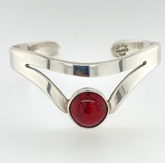 "Vintage Taxco Mexico Sterling Silver and Red Jasper Cuff Bracelet - Very pretty modern tiara style with cutout in the silver - A nice deep red jasper stone, bezel set - Fine Sterling silver, marked \"925\" - Made in Mexico - Cuff has markings that are difficult to read. Can make out \"Mexico\" and \"925\", believe the other letters and numbers are the Taxco markings - Cuff measures about 5.5\" end to end with an opening of 1\" - Max width of cuff at the center is about 1\" - Jasper stone measur Elegant Red Sterling Silver Cuff Bracelet, Modern Tiara, Mexican Silver Jewelry, Open Bracelet, Red Jasper Stone, Native Jewelry, Vintage Belts, Cross Jewelry, Jasper Stone