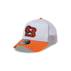 The Cincinnati Bengals City Originals 9FORTY A-Frame Snapback features an embroidered throwback Bengals logo at the front panels with an alternate team logo at the right-wear side. Additional details include a snapback closure at the rear and an orange undervisor. White Hat With Letter Patch For Streetwear, White Letter Patch Hat For Streetwear, White Streetwear Hat With Letter Patch, White Trucker Hat With Logo Patch For Baseball Season, White Curved Bill Trucker Hat For Game Day, White Trucker Hat With Letter Patch And Curved Bill, Throwback White Hat For Streetwear, White Trucker Hat With Embroidered Logo For Game Day, Team-colored Trucker Hat With Curved Brim For Streetwear