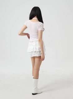 Product Detail Looking for trendy Korean fashion? Look no further than our Tiered Mini Skirt BM304! Inspired by KPOP fashion icons like BLACKPINK and TWICE, this frilly, banded skirt is perfect for festival season. Available in a range of colors, including white, pink, and black, our skirt is made with 100% high-quality polyester. Get yours today and add a touch of romance to your wardrobe! Style : Romantic Occasion : Festival Detail : Frill, Banded Print : Solid Material : Polyester Length : Mi Spring Y2k Stretch Mini Skirt, Spring Y2k Style Stretch Mini Skirt, Fitted Summer Skirt In Y2k Style, Summer Fitted Y2k Skirt, Summer Fitted Y2k Style Skirt, Fitted Mini Skirt With Ruffles, Y2k Fitted Mini Skirt With Ruffles, Y2k Style Fitted Mini Skirt With Ruffles, Summer Y2k Fitted Skirt