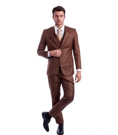 Indulge in the warm tones of the Apollo Collection Cognac Sharkskin Three-Piece Suit. This suit's luxurious shade and hybrid fit merge to create an exceptionally stylish and comfortable ensemble, suitable for any elegant occasion.   Key Features:     Material:  Premium sharkskin for a subtle texture and sheen.   Jacket Style:  Single breasted with a two-button closure.   Lapel:  Notch lapel for a classic and versatile look.   Pockets:  Two flap pockets on the jacket.   Vest:  Sharkskin, five-button, V-neck design.   Pants Fit:  Hybrid fit for a comfortable yet flattering silhouette.   Pants Style:  Flat front for a smooth, contemporary appearance.   Pants Pockets:  Two back besom pockets and two angled front slip pockets.     Sizing Advice:  When choosing a hybrid fit suit, measure your ch Brown Groomsmen Suits, Brown Groomsmen, Brown Tuxedo, Sharkskin Suit, Modern Fit Suit, Dapper Suits, Cheap Suits, Brown Wedding, Groomsmen Suits