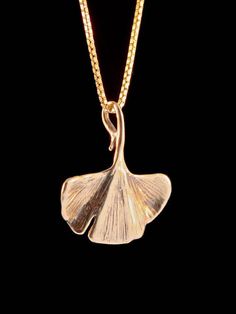 This delicate and detailed Ginkgo Leaf Charm is cast in 14k solid Gold. The charm is 3/4" high and 3/4" across and is detailed both front and back. Marty was inspired to design this piece during her recent hiatus in Okinawa, Japan. Okinawa is known for "slow time," and perhaps this image will remind us all to slow down and breath in the beauty of nature.The gold chain is not included in the price. If you would like a solid 14k gold chain please select the stye and length from the option menu. If Jewelry Japanese, Japan Okinawa, Gold Leaf Necklace, Japanese Jewelry, Okinawa Japan, Ginkgo Leaf, Leaf Jewelry, Leaf Charms, Leaf Necklace