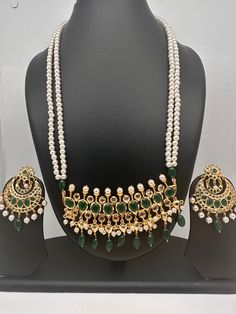 Color Stone Hyderabadi Jadau Pendent Double Line Pearls Necklace with matching chandbali earringsColor : Golden, Pearl WhiteSize : Necklace Length : Approx 18 Inches; Earring Length 2 Inches; Pendent Length 1.75 InchesStones : --Color-- Stone Hyderabadi Jadau and Pearls Jadau Necklace, Necklace Traditional, Golden Pearl, Pearls Necklace, Color Stone, Green Necklace, Necklace Length, Indian Jewelry, Pearl White