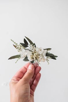 Elevate your wedding day with our exquisite bridal hair comb, meticulously handcrafted with the finest preserved flowers like hydrangea, baby's breath and eucalyptus.   Color: off-white, ivory, green 🌿 Lightweight and Delicate: Our carefully designed bridal hair comb is not only a visual delight but also incredibly lightweight, ensuring comfort throughout your special day. 👰 Customizable Ensemble: Create a cohesive and magical look with matching accessories. Explore our range of flower crowns Wedding Hair With Eucalyptus, Wedding Hairstyles Eucalyptus, Eucalyptus Wedding Hair Piece, Boho Wedding Hair Comb, Eucalyptus Hair Comb, Bridal Hair Comb Side Floral, Boho Wedding Hair, Hair Comb Wedding, Timeless Gifts