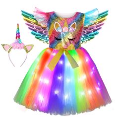 PRICES MAY VARY. LED Light Up Girl Unicorn Costume- Include: 1 LED light up Unicorn dress+ 1 Unicorn headband (Without Lights)+1×Wings(Without Lights). Modern Design: Our Unicorn Costume is handmade, designed with colorful lights that glow in the dark, your girl is sure to stand out from the crowd. Easy to Wear - The unicorn costume top with new Tulle Flying Sleeve and Sleeveless design, and has a unicorn pattern,The back is elastic,so your girls can stretch and move without causing stress on se Girls Unicorn Costume, Girl Unicorn Costume, Girls Mermaid Costume, Halloween Tutu Dress, Stretch Crochet, Halloween Led Lights, Light Fairy, Unicorn Wings, Halloween Tutu