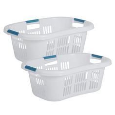 two white plastic laundry baskets with blue handles