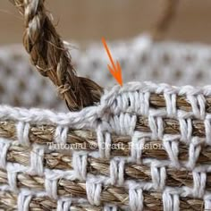 a close up of a basket with an orange arrow pointing to the bottom and two ends