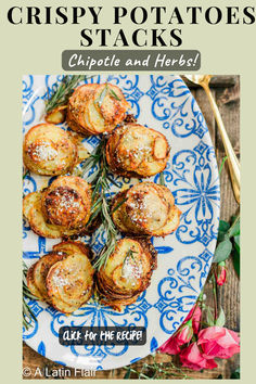 crispy potatoes stacks on a blue and white plate with pink flowers in the background