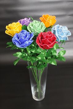 A bouquet of rainbow roses is made of 2 types of Czech beads according to my own author's pattern. The height of roses is 45 cm. The beads sparkle and shimmer very nicely. Roses will be a great gift for your family and friends, as well as a nice addition to your interior Beaded Bouquet, Beaded Rose, Beaded Projects, Bouquet Roses, French Beaded Flowers, French Flowers, Origami 3d, Rainbow Roses, Artificial Flower Arrangements